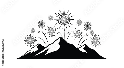 A stunning view of fireworks bursting above mountainous terrain captured in a dark silhouette