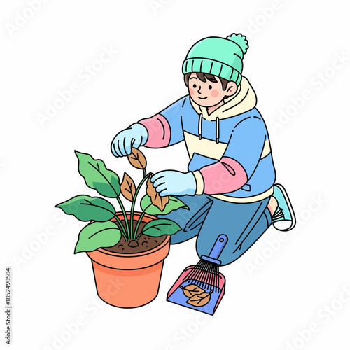 A person in a beanie and gloves diligently cleans a potted houseplant, removing dry leaves with a dustpan