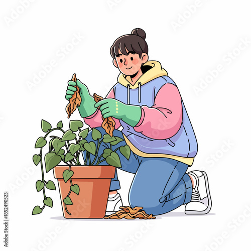 Dedicated Gardener Tending to Potted Plant, Gently Pruning Withered Foliage for Healthy Growth