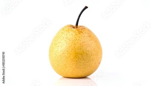A single round Asian pear (Nashi pear) with smooth yellow skin placed on a neutral gray surface. The minimalist setup emphasizes purity and freshness, suitable for wellness branding.