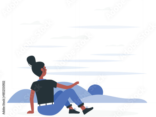 Woman sitting on ground looking out at landscape view desi