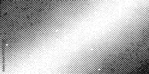 Seamless abstract industrial background featuring a dark gray metallic mesh grid pattern with textured steel circles and silver chrome material design for a professional carbon fiber wallpaper