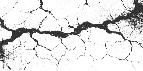 Black and white cracked earth texture with rough surface and granular details