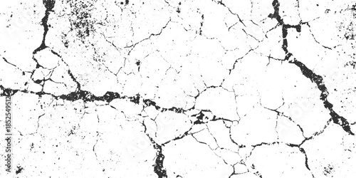 Black cracks and speckles on white textured background abstract