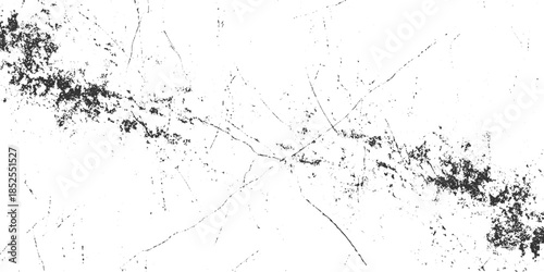 Black and white grunge texture with scratches and speckles