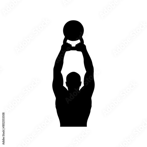 Silhouette of athlete lifting kettlebell overhead.