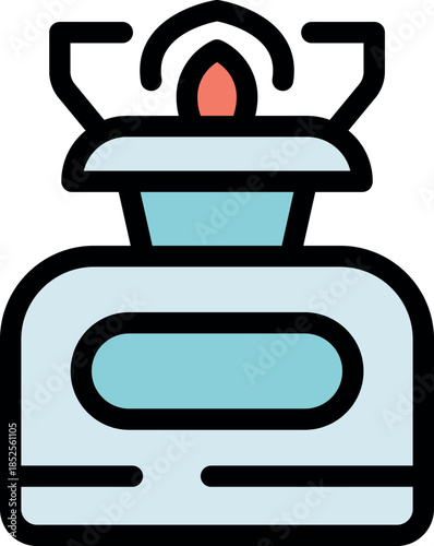 Portable camping stove burning with a blue flame, ideal for cooking during outdoor adventures and providing warmth