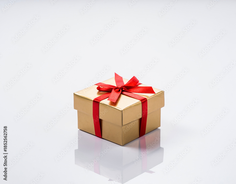Obraz premium Gift Box with Red Ribbon