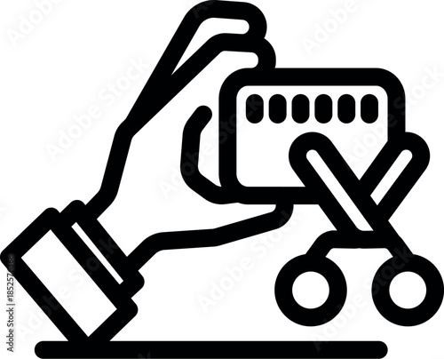 Hand cutting credit card with scissors, symbolizing debt cancellation, financial freedom, or consumer protection