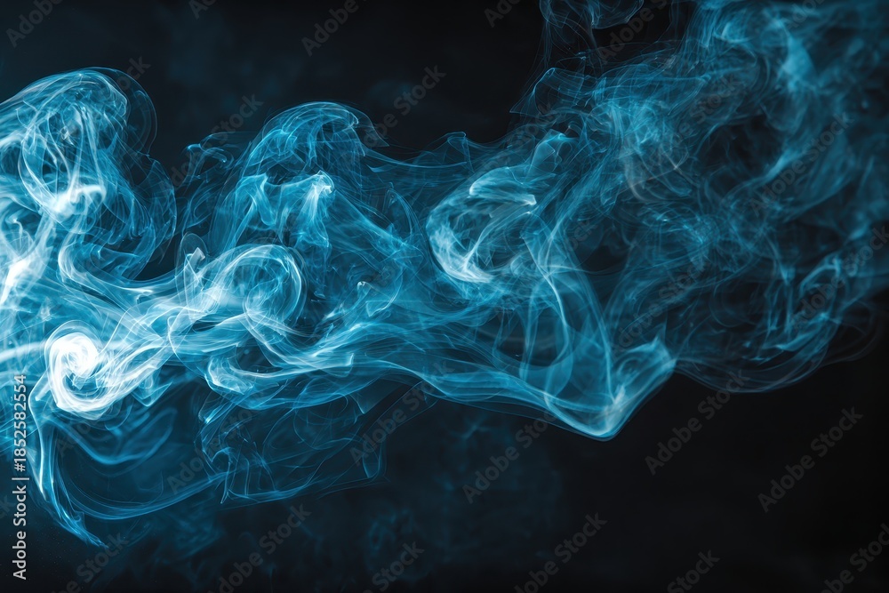 Fototapeta premium Swirling patterns of blue abstract smoke create a mesmerizing display against a dark background, capturing the essence of movement and fluidity in an artistic form