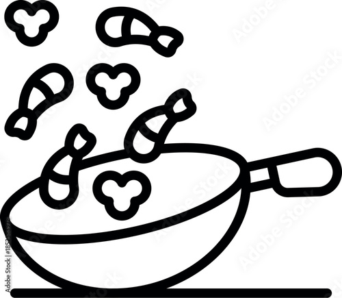 Shrimps are tossed in a wok with spices, creating a flavorful and visually appealing culinary experience