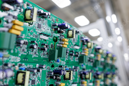 Bild auf Leinwand Closeup of assembled power electronics circuit board in modern manufacturing fac