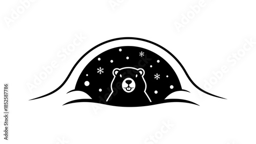 A polar bear peeks out from under the snow on a snowy night with falling snowflakes around it.