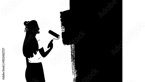 Creative person painting a wall black with a roller, transforming a space with bold color.