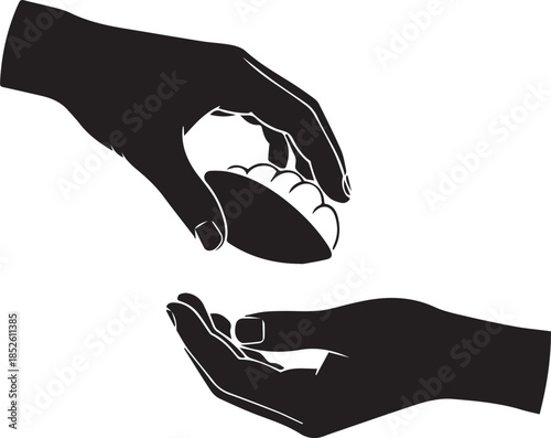 Silhouette of hands giving and receiving a small object