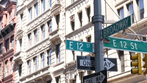 New York City Broadway street sign on Manhattan, United States. Urban road sign in american city. Traffic sign in Midtown of NYC, USA. Building architecture in residential district near Union Square.