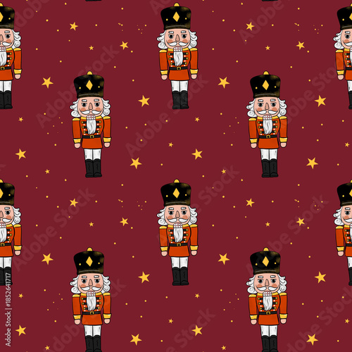 Nutcracker figures are arranged in a repeating pattern with stars on a red background during the holiday season