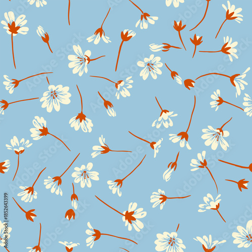 Seamless vector pattern with scattered chamomile flowers and buds featuring warm orange stems and soft cream petals on a light blue background. Fresh floral design ideal for textiles