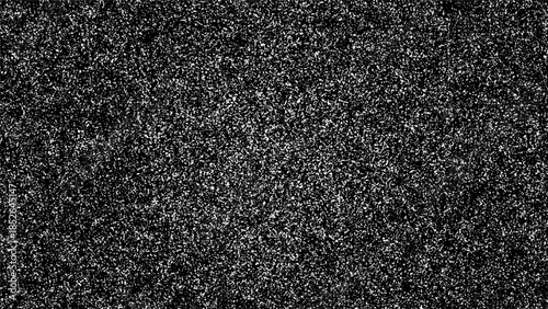 A close up view of a black and white textured surface with a grainy noise patternact background with glitter effect