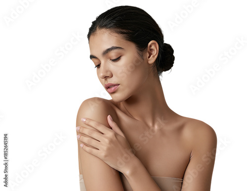 Young woman gently touching her shoulder
