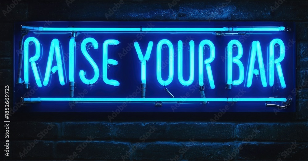 Fototapeta premium Bright neon sign displays text. Dark brick wall provides background. Simple, bold message radiates energy, inviting motivation.