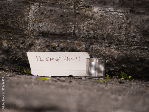 Please help sign with tin can for money donations