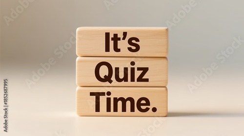 Stacked wooden blocks with bold text announcing an interactive quiz time session