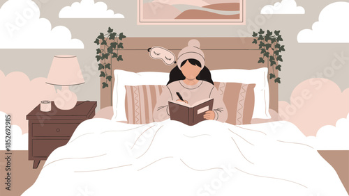 A woman wearing a cozy sweater and beanie is journaling or writing in a diary while sitting comfortably in her bed in the morning.