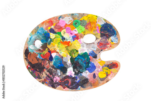A classic oval artist's palette covered with colorful strokes of fresh paint. An isolated object No background symbolizing the creative process, inspiration, art, and professional painting.