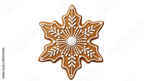 Detailed gingerbread snowflake cookie with intricate white icing isolated on white background
