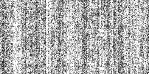 Black and white vertical textured lines pattern with rough grain abstract background