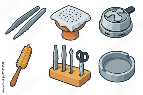 Assorted metal tools and accessories on a white surface