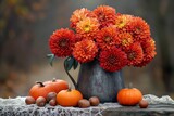 selective focus cozy autumn flowers pumpkins still life