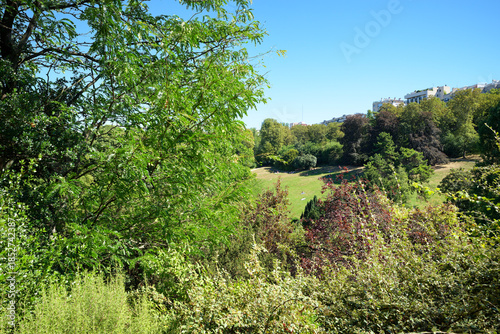 Hills on the Buttes-Chaumont park. 19th arrondissement of Paris city