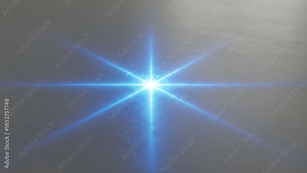 Fototapeta premium Vibrant blue starburst effect on dark background