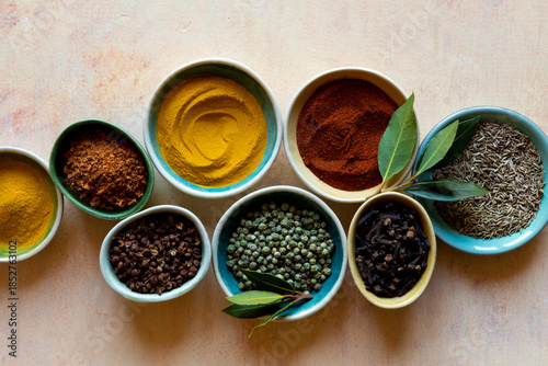 Mixed culinary spices turmeric powder peppercorn