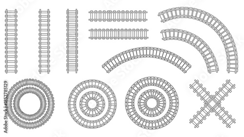 A collection of various train track pieces in a simple black and white illustration