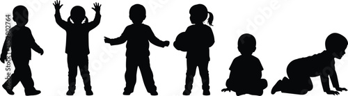 Vector collection of black silhouettes of little children playing, walking, crawling and sitting isolated on white for design projects