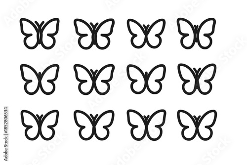 Seamless pattern of stylized butterflies in dark grey