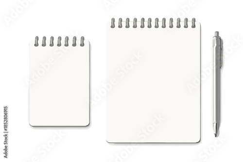 Two blank spiral notebooks and a pen on a dark background