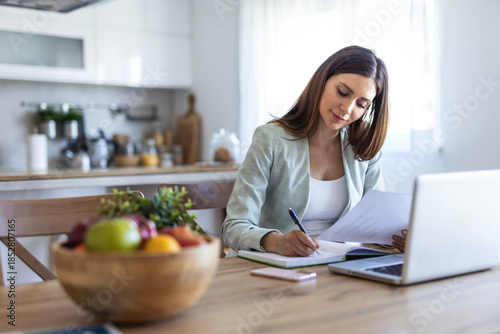 Photos Laptop and writing with business woman in office for real estate broker, property listing and planning