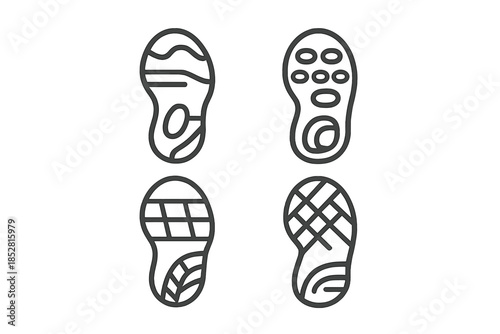 Four Shoe Soles with Different Tread Patterns