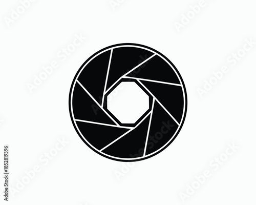 Black camera aperture diaphragm symbol with octagonal opening on white lens photography
