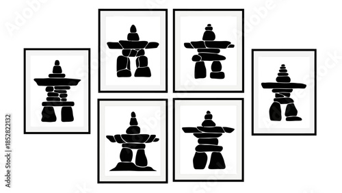Collection of Inukshuk stone sculptures displayed in frames.
