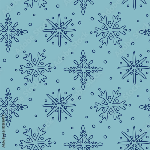 Seamless pattern with dark doodle snowflakes of various shapes on blue with circles. Minimalistic winter design for wrapping paper, Christmas gifts, seasonal textile prints or holiday digital images.
