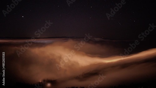 time lapse night  clouds/ city under clouds