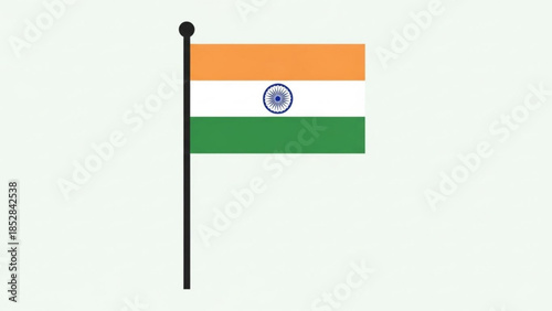 Indian flag waving on a black pole with orange, white, and green horizontal stripes and a blue wheel symbol, national pride and identity