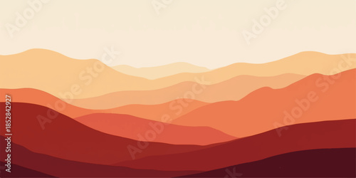 Warm sunset over layered mountain ranges in earthy tones