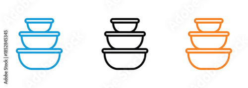 Colorful stacked bowls in blue, black, and orange on white background