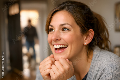 Serene Smile in Warmth: Capturing a moment of pure bliss and optimism, a woman's radiant smile lights up a cozy setting, her face conveying contentment and heartfelt joy.